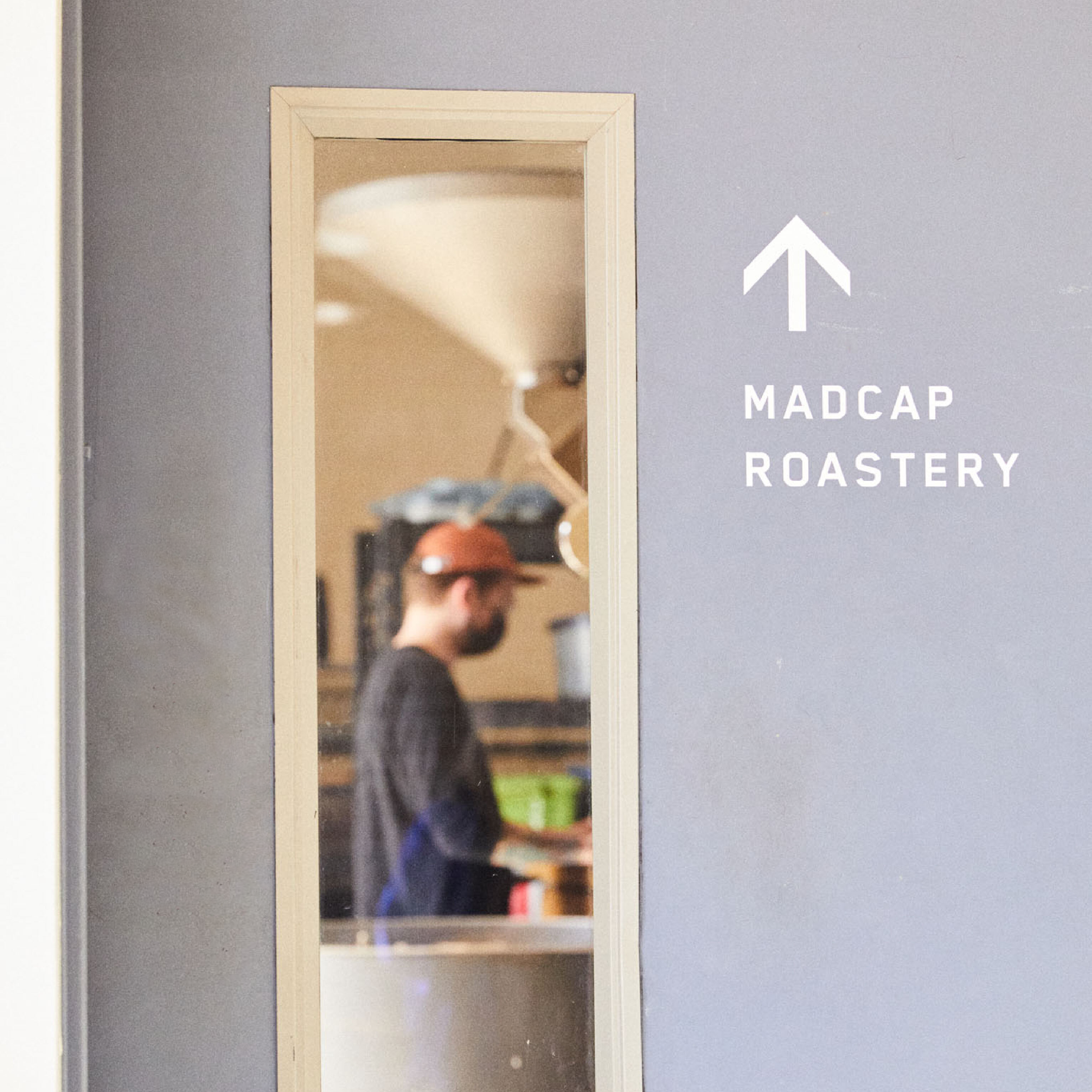 Door at Madcap Coffee roastery